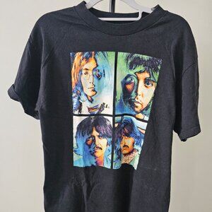 The Beatles.  T-SHIRT. Size M  Black, with the graphic in multiple colors.